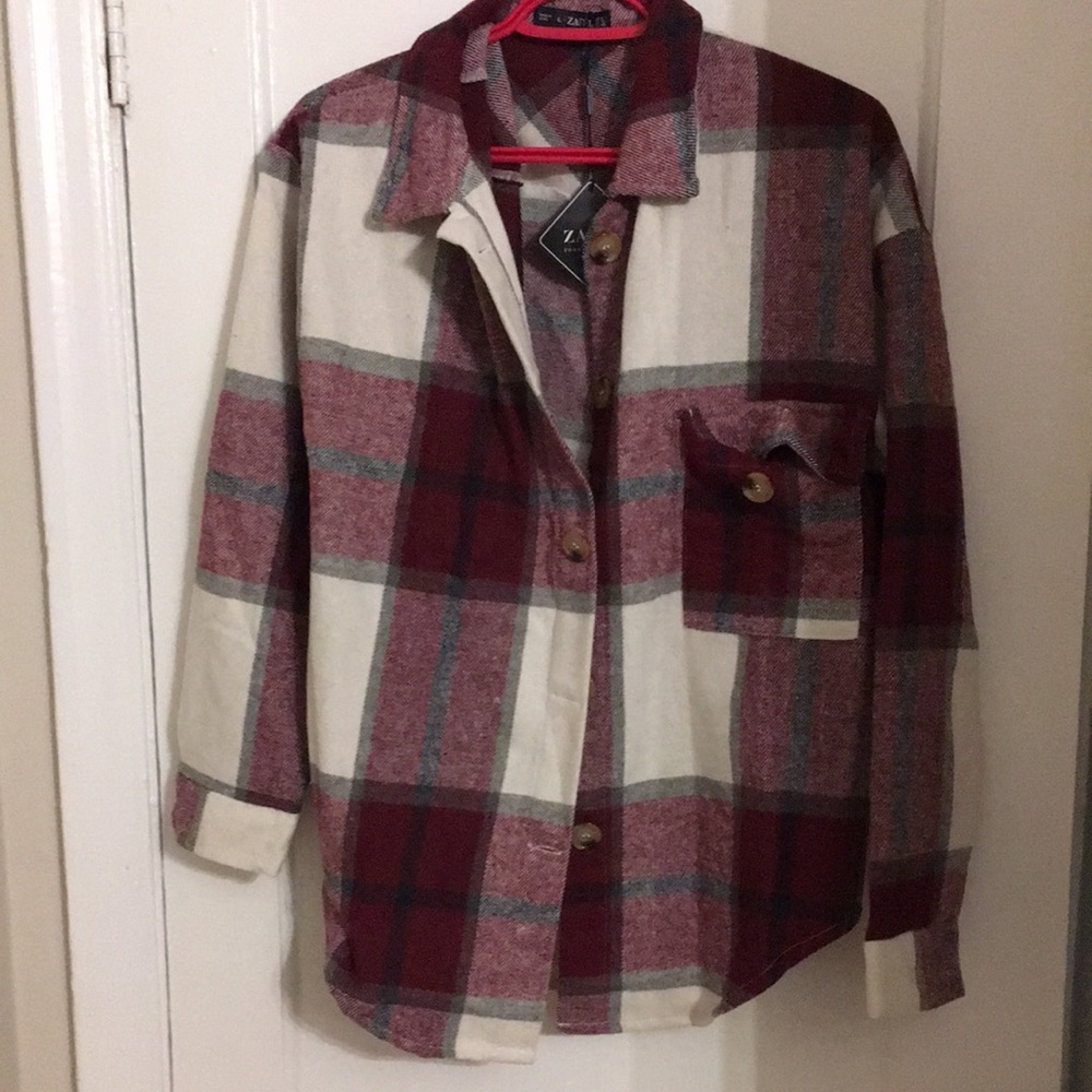 Plaid shirt/ jacket.